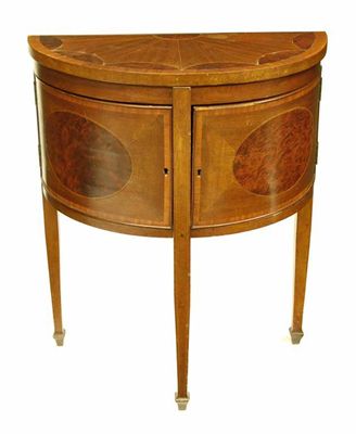 Appraisal: A mahogany and inlaid demi-lune side table in George III