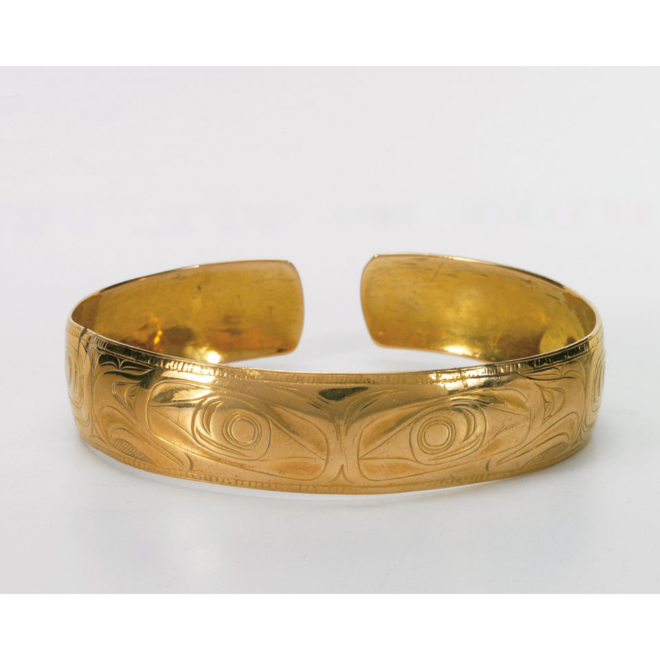 Appraisal: CHARLES EDENSHAW GRADE YELLOW GOLD OPEN-CUFF BANGLE with engraved native