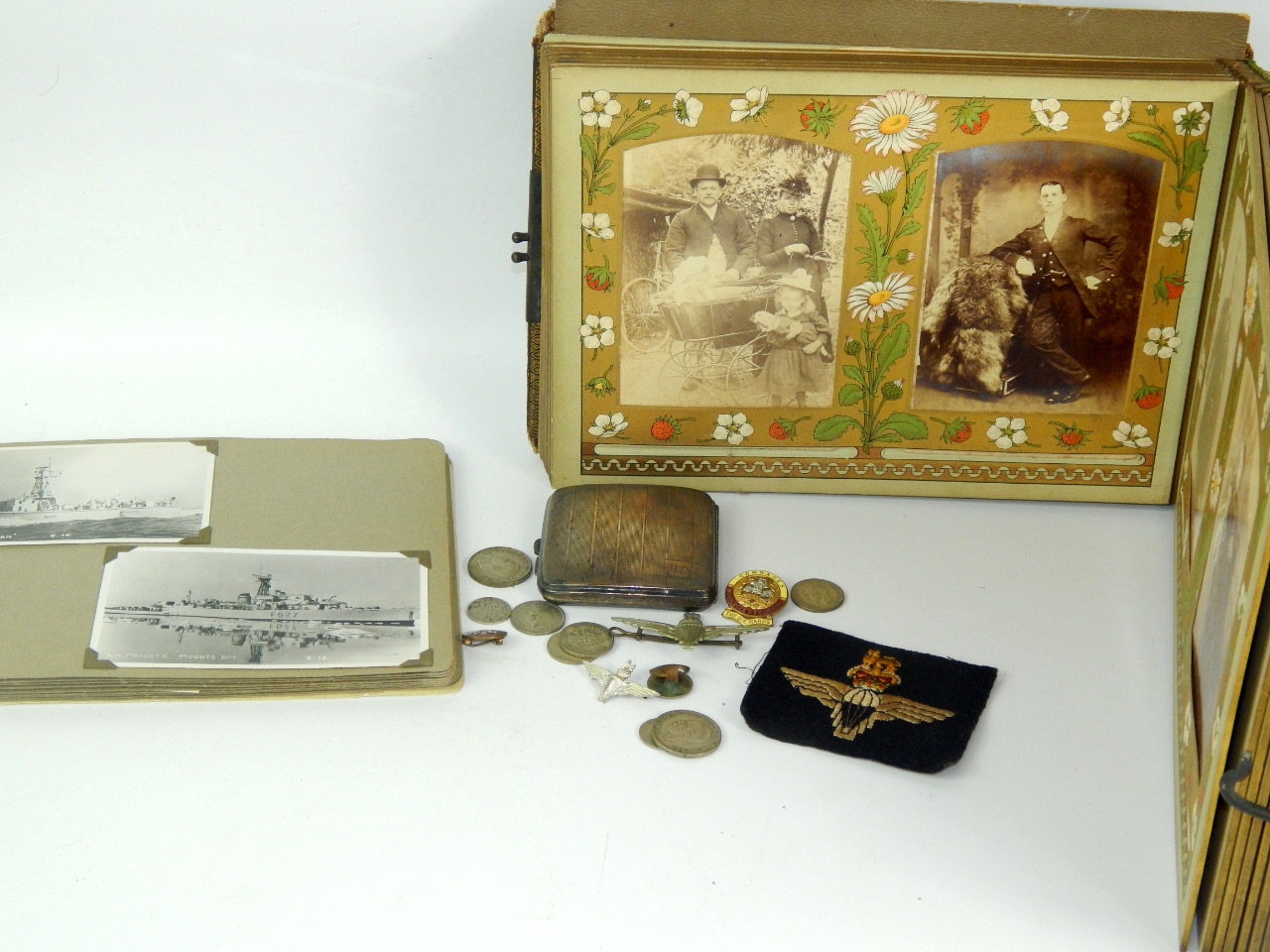 Appraisal: A Victorian photograph album silver cigarette case Birmingham Parachute and