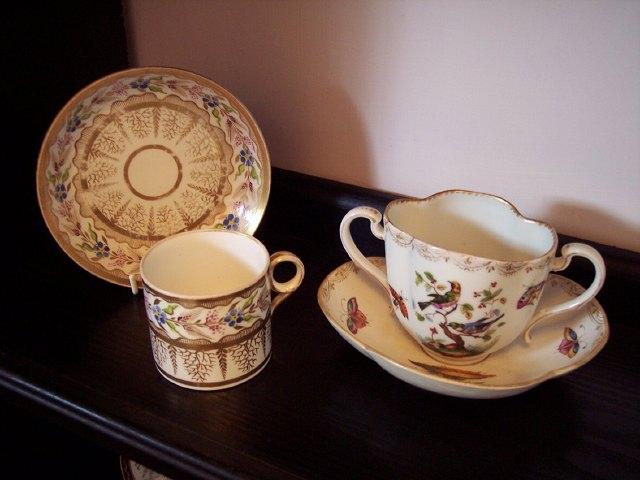 Appraisal: A Minton's coffee can and saucer decorated in gilt and