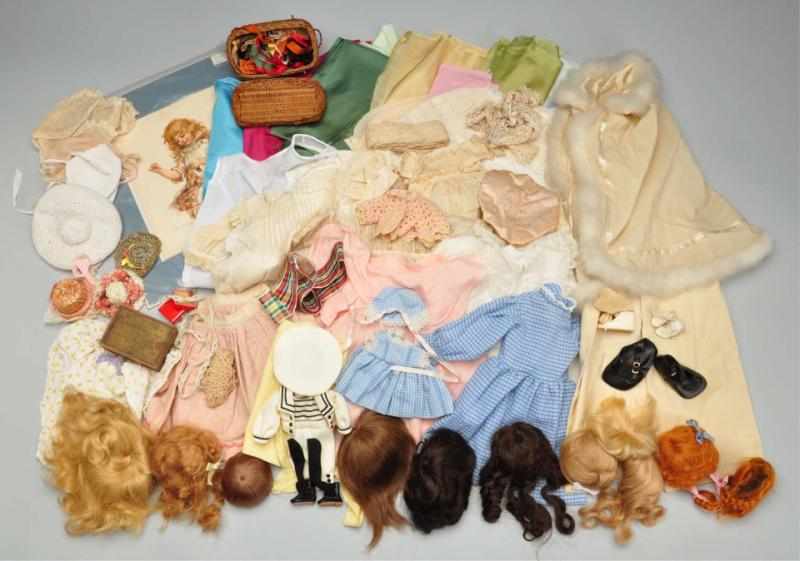 Appraisal: Lot of Antique Doll Clothes Wigs Description Various sizes white