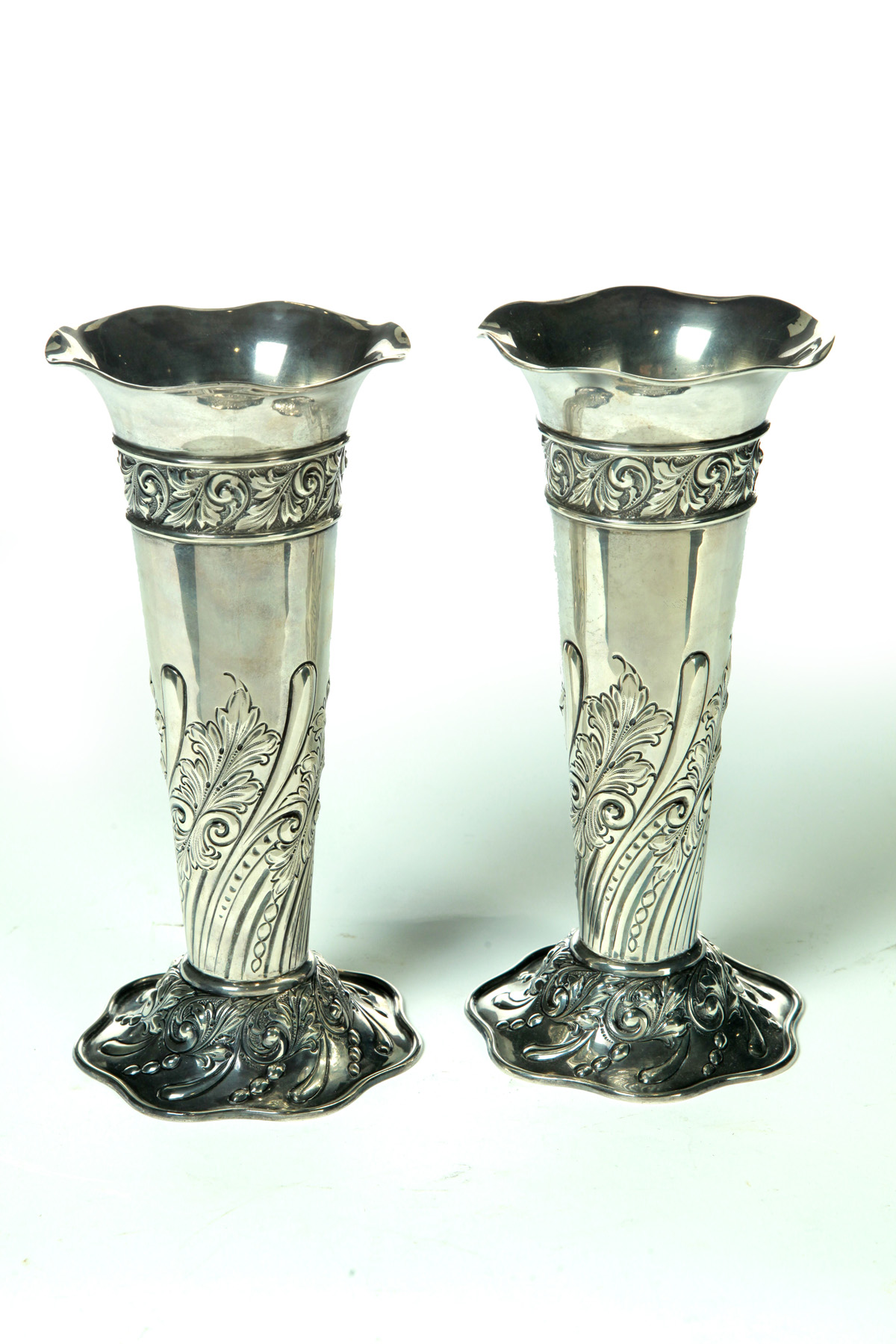 Appraisal: PAIR OF ENGLISH STERLING VASES Circa Trumpet shaped with chased