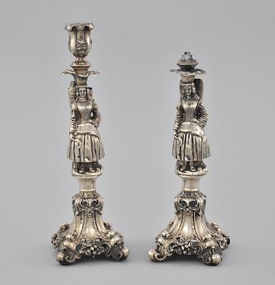 Appraisal: A Pair of Figural Silver Candleholders With no hallmarks found