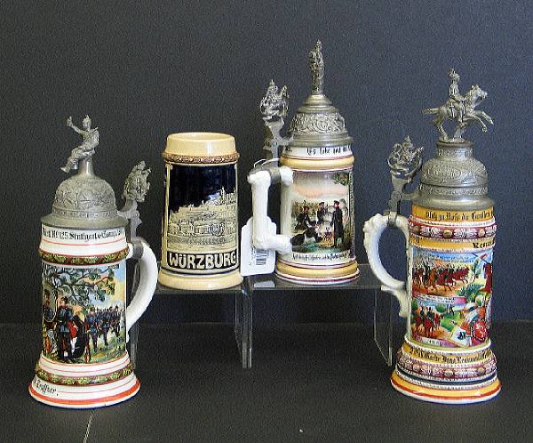 Appraisal: Three porcelain lithophane military steins first quarter th century Comprising