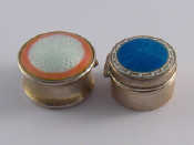 Appraisal: Two silver champleve enamelled pillboxes one blue cm across Henry