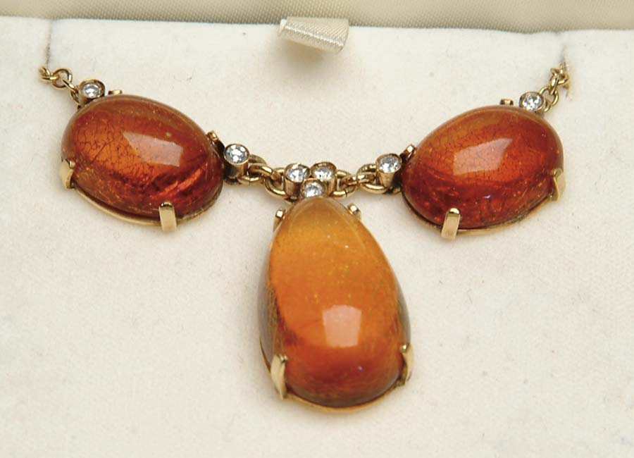 Appraisal: KT AMBER AND DIAMOND NECKLACE Nice antique necklace is set