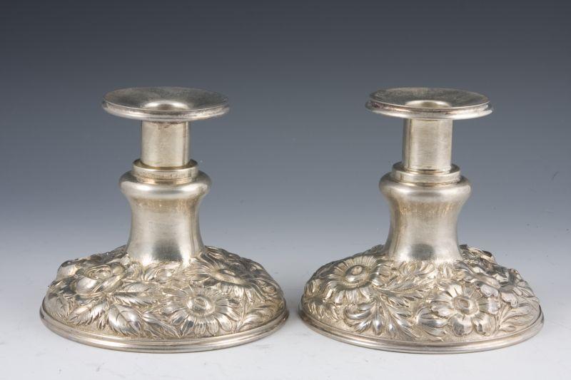 Appraisal: Pair of Stieff Sterling Repousse Candlesticks bold floral repousse motif