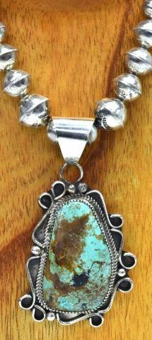 Appraisal: Native American silver content unknown necklace sterling pendant with bezel-set