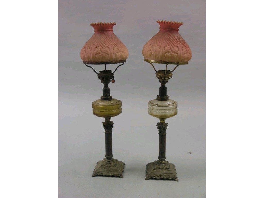 Appraisal: A pair of Victorian oil lamps alabaster stems with corinthian