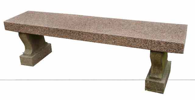 Appraisal: A NEO-CLASSICAL VARIEGATED PINK GRANITE GARDEN SEAT with rectangular slab