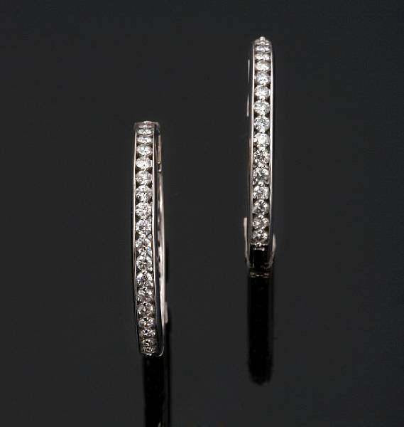 Appraisal: A pair of diamond hoop earrings set with round brilliant