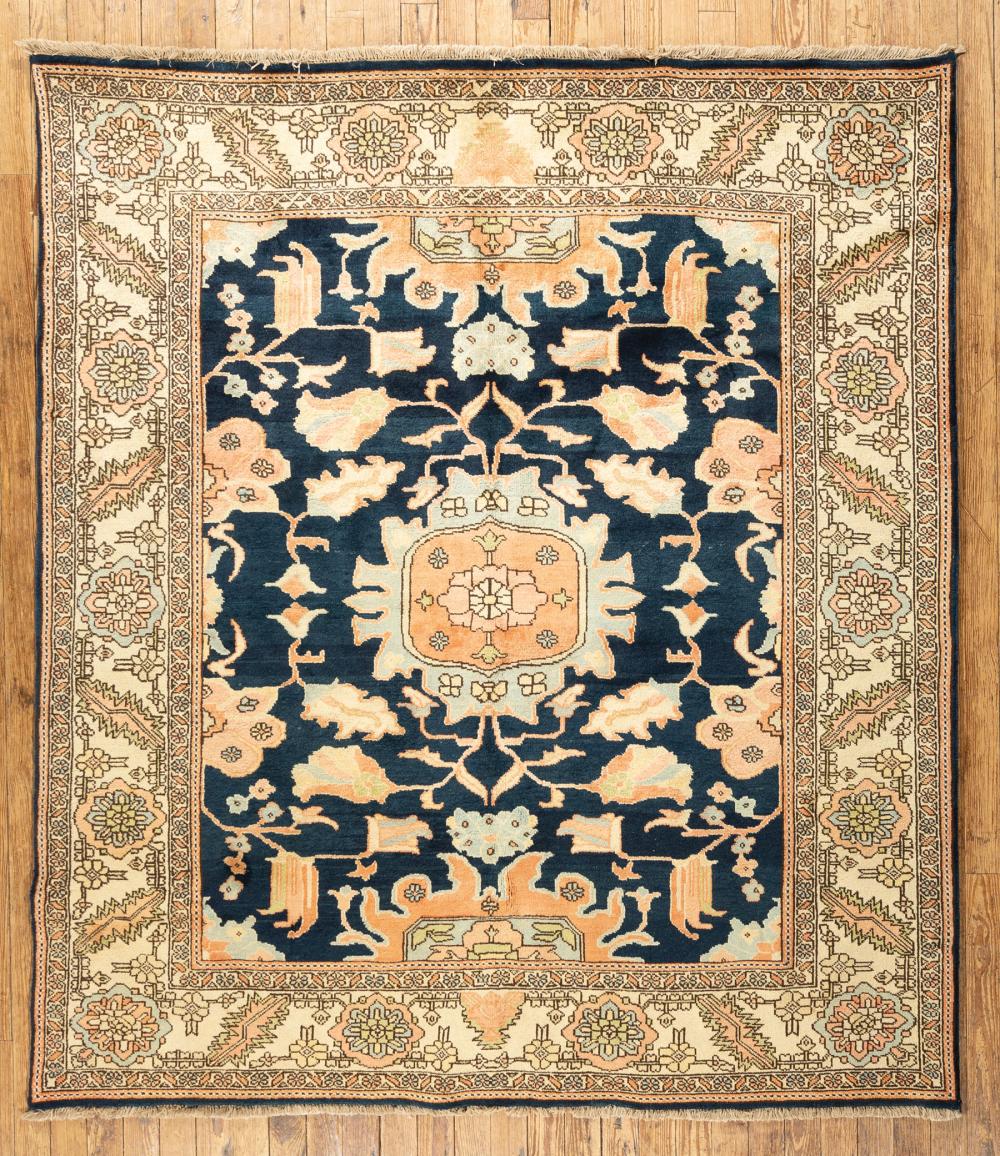 Appraisal: Persian Serapi Carpet blue ground stylized floral design ft x