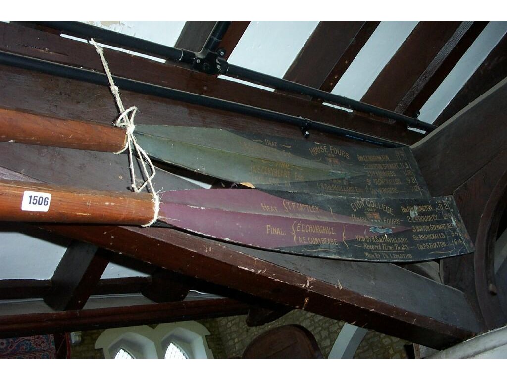 Appraisal: A pair of Eton College rowing oars the painted blades