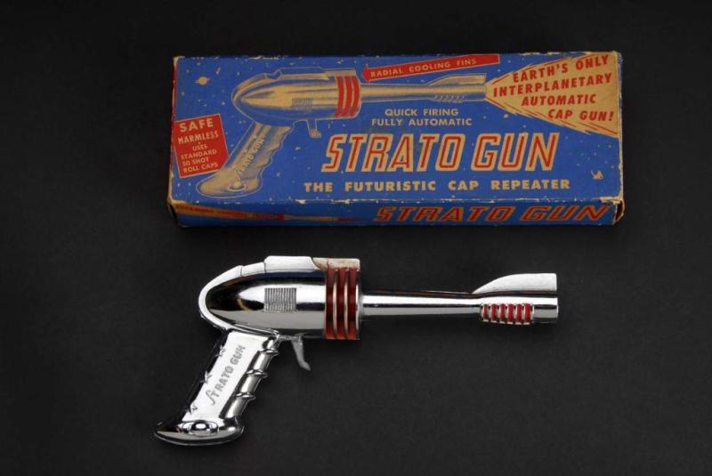 Appraisal: Strato Gun Toy Description American Working When trigger is pulled