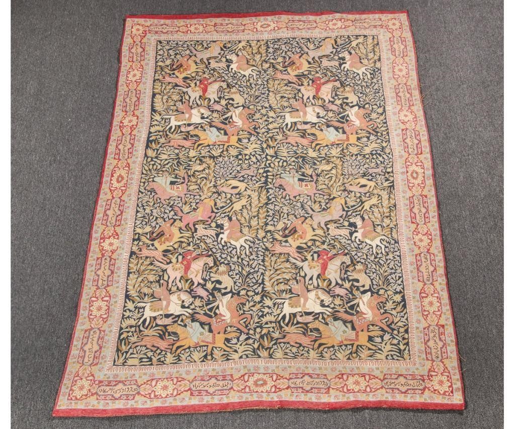 Appraisal: Colorful Persian needlework carpet signed with hunter on horseback x