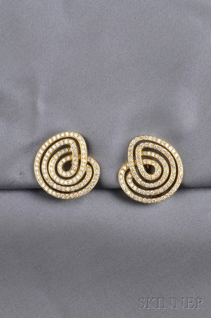 Appraisal: kt Gold and Diamond Earclips each scrolling form bead-set with