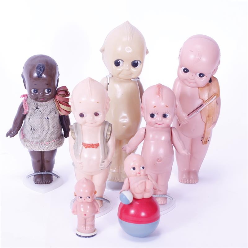 Appraisal: Seven Vintage Celluloid German Kewpie Dolls Pencil sharpener Kewpie Balance