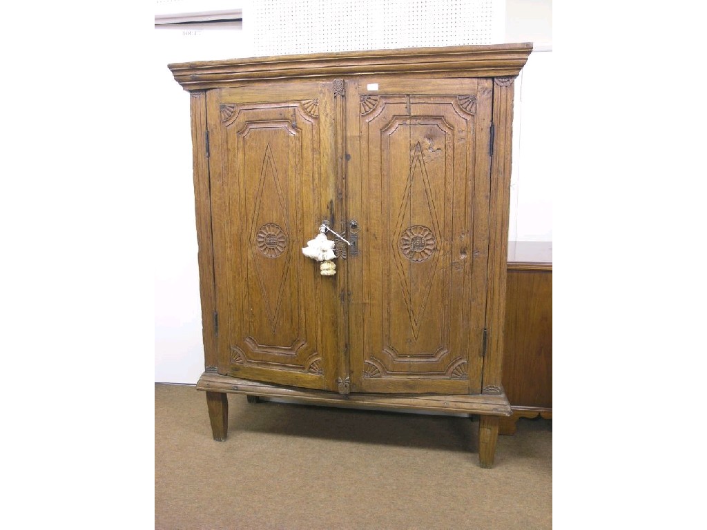 Appraisal: An imported hardwood armoire in th century-style pair of cupboard