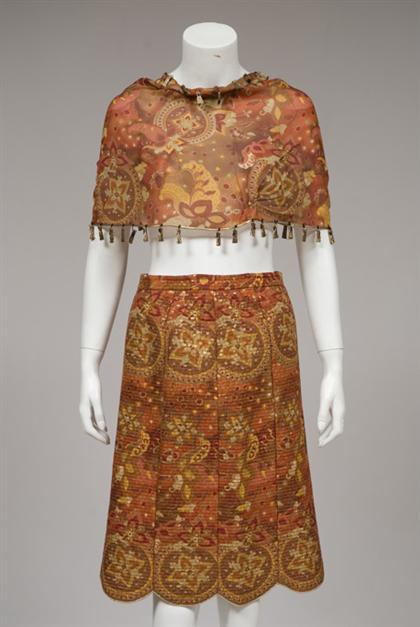 Appraisal: Four Lilianfell suits s In brightly colored jeweltone metallic-flecked brocades