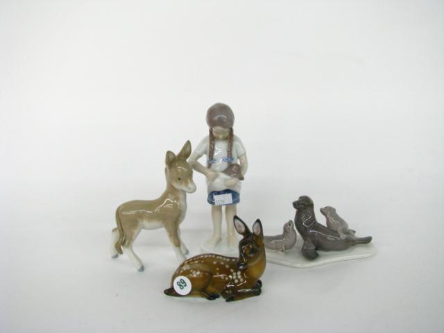 Appraisal: Group of four small porcelain figurines including Rosenthal deer Lladro