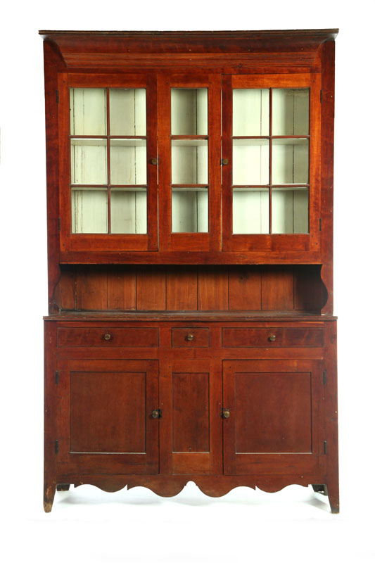 Appraisal: STEP-BACK CUPBOARD American early th century cherry with old finish