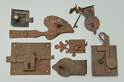 Appraisal: Seven hand wrought locks and latches one with asymmetrical heart