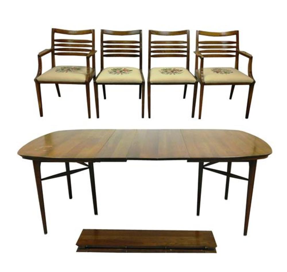 Appraisal: Mid-century dining table with five insert leaves h x w