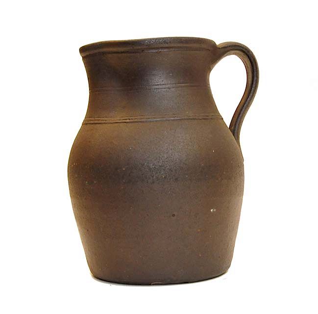 Appraisal: th Century Shaped Brown Pottery Pitcher th Century Shaped Brown