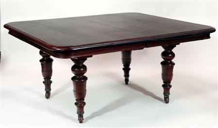 Appraisal: A Victorian mahogany extending dining table the moulded rectangular top