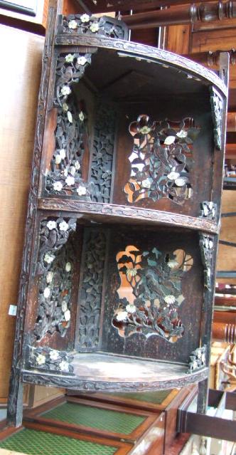 Appraisal: An early th century hardwood and mother of pearl inlaid