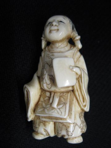 Appraisal: Carved Ivory Netsuke of a Young Girl holding a book