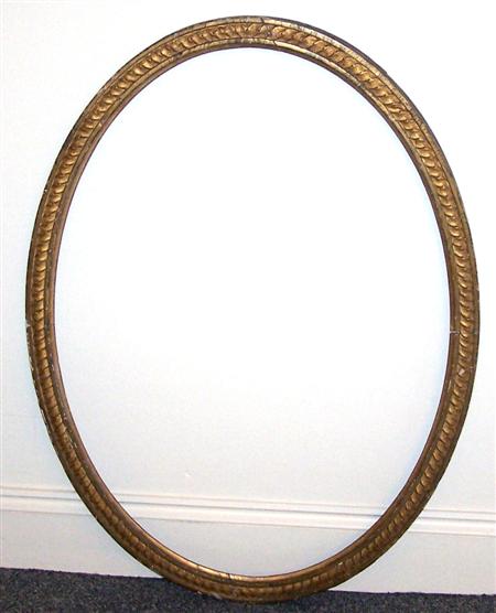 Appraisal: GEORGE III CARVED GILTWOOD OVAL MIRROR FRAME LATE TH CENTURY