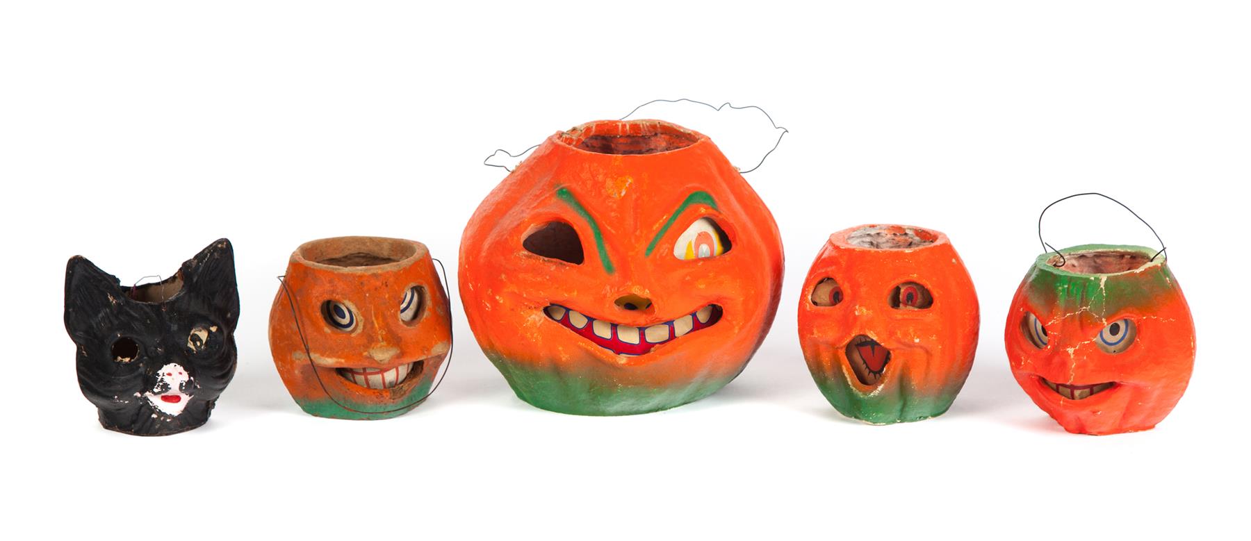 Appraisal: FOUR PAPIER MACHE JACK-O-LANTERNS AND A PAPIER MACHE BLACK CAT