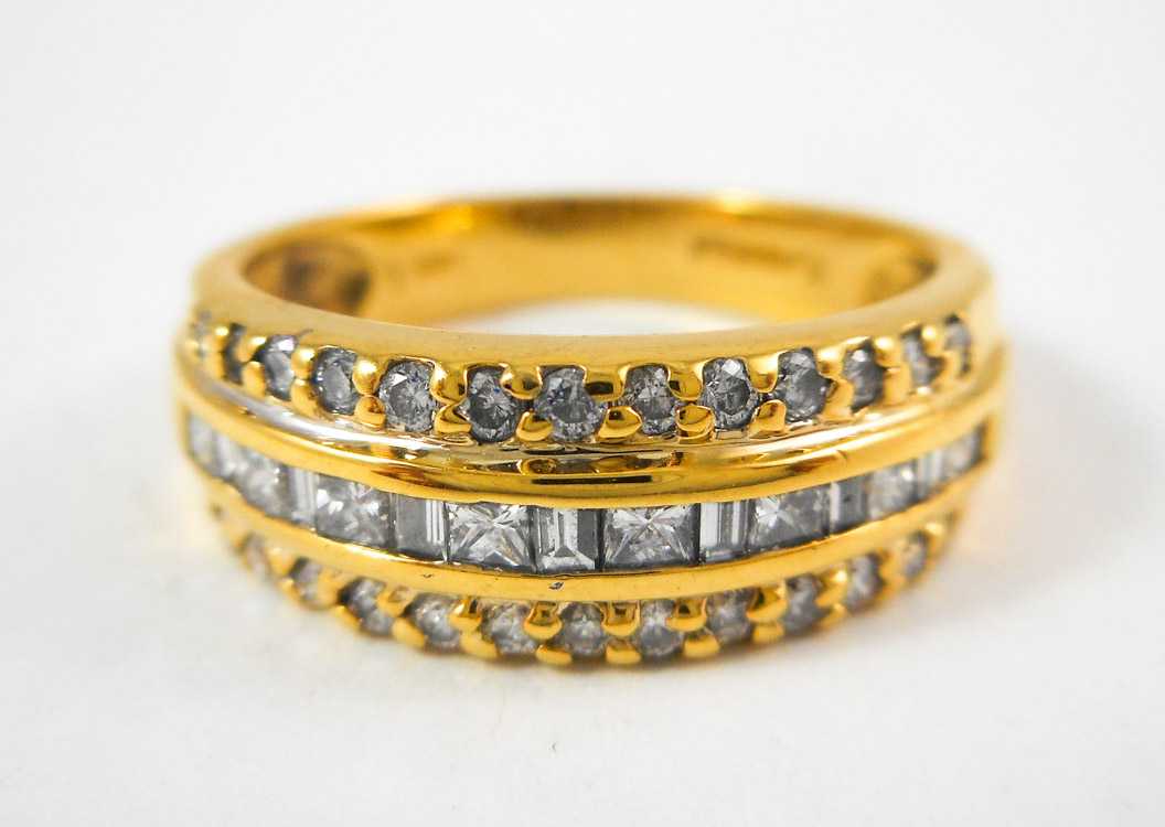 Appraisal: DIAMOND AND FOURTEEN KARAT GOLD RING with two rows of