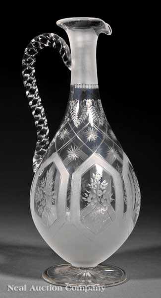 Appraisal: An Antique Cut and Etched Glass Claret Jug th c