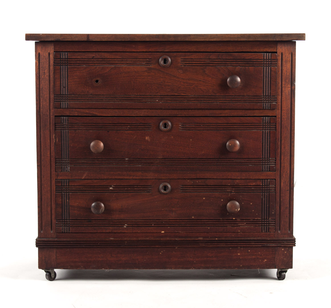 Appraisal: Victorian walnut three-drawer chest third quarter- th century with incised