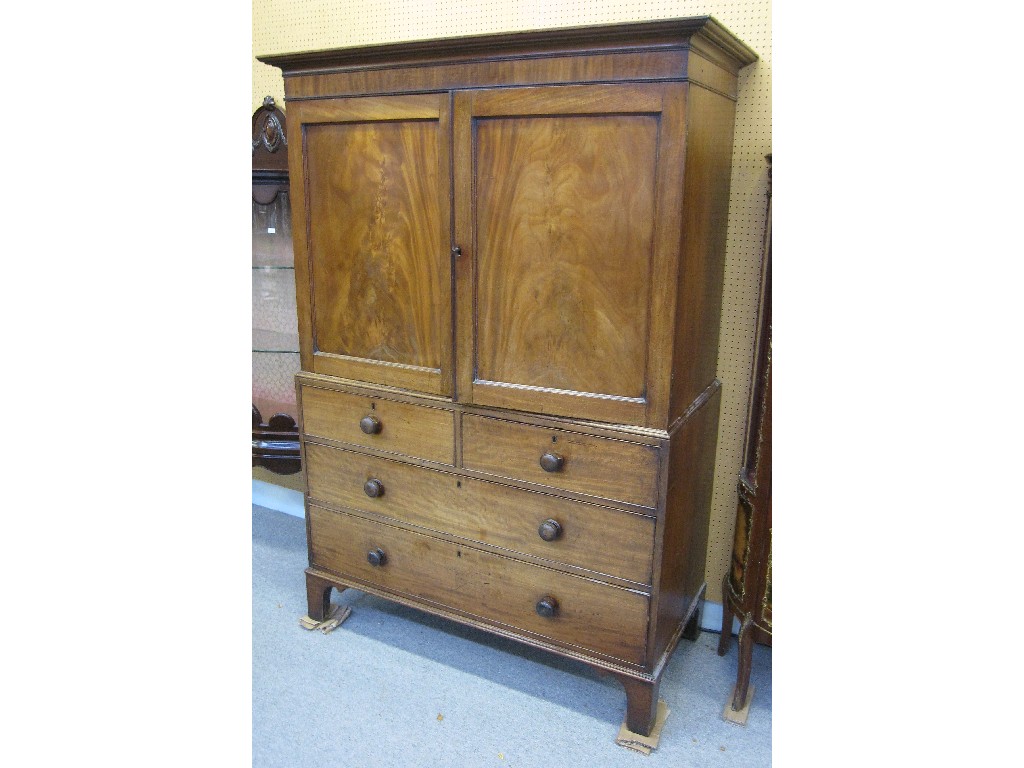 Appraisal: Georgian mahogany linen press the top opening to reveal pull