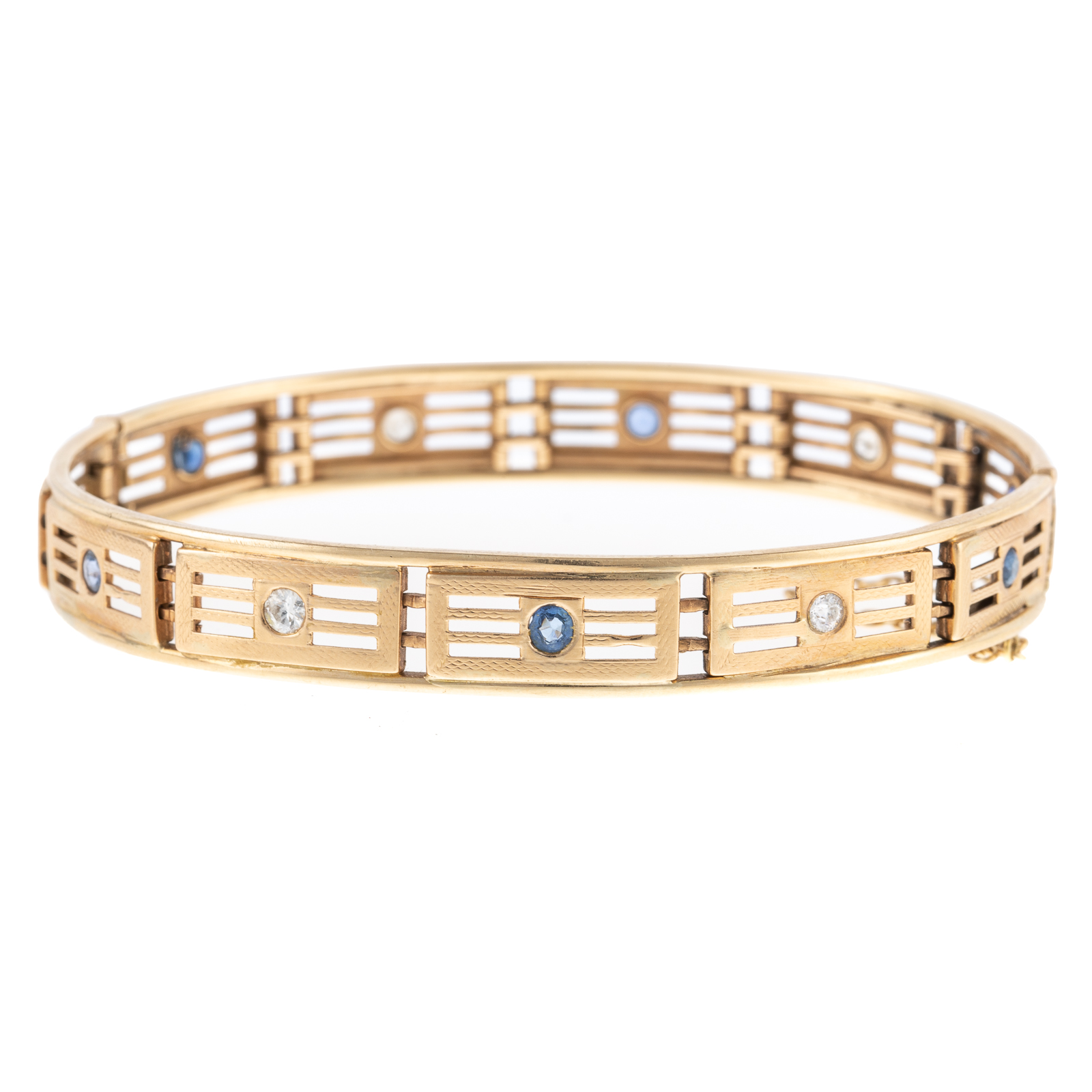 Appraisal: A SAPPHIRE DIAMOND HINGED BANGLE IN K K yellow gold