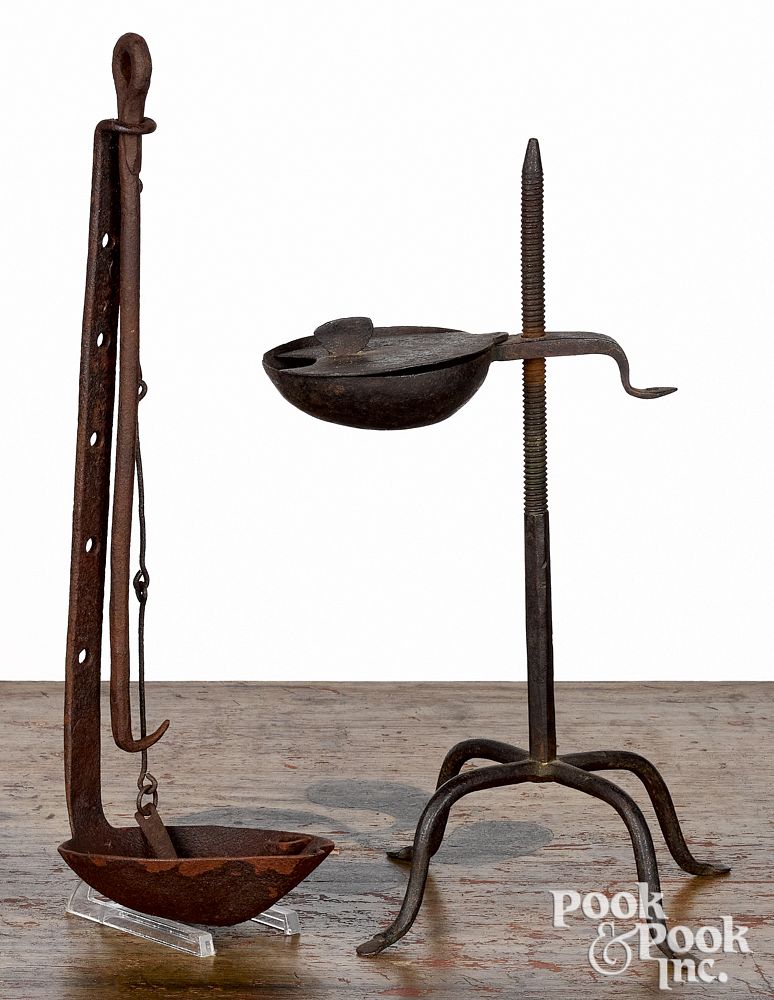 Appraisal: Two wrought iron pan lamps th c Two wrought iron