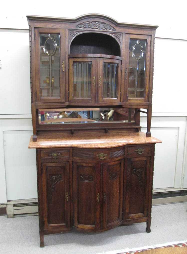 Appraisal: CARVED OAK SIDEBOARD WITH MARBLE TOP Belgian c in two