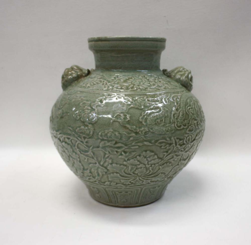 Appraisal: CHINESE CELADON GLAZED POTTERY JAR with high shoulders and tapered