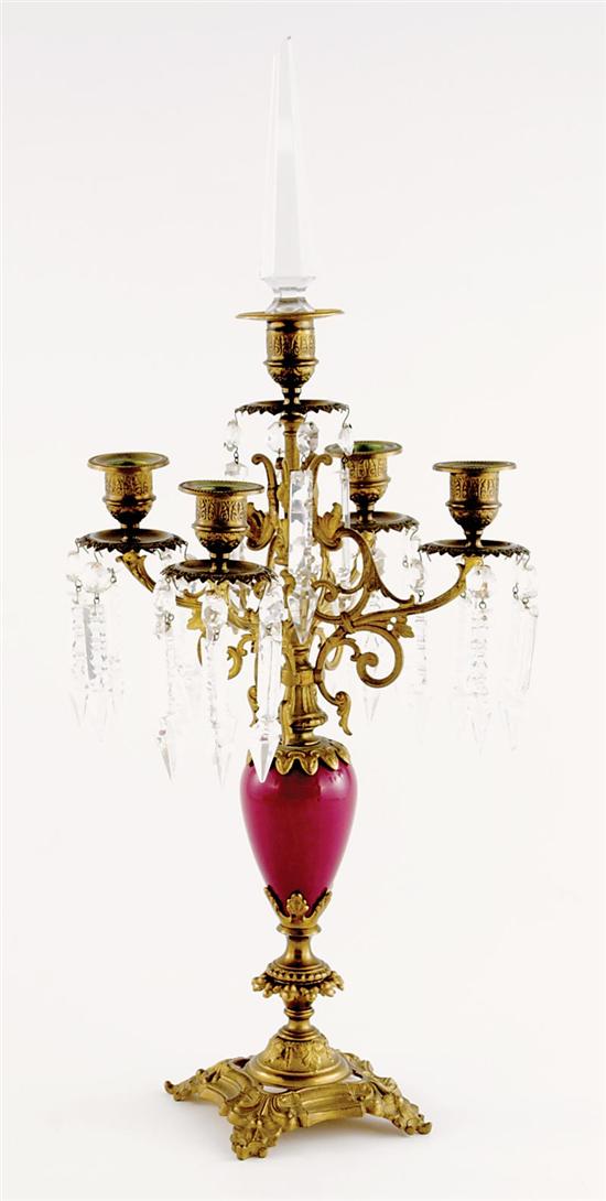 Appraisal: French ormolu mounted porcelain four-light candelabra circa prism supported by