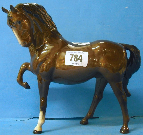 Appraisal: Beswick Horse Head Tucked Leg up Brown