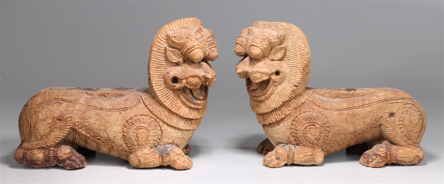 Appraisal: Two antique Thai th century carved stylized lions the lions