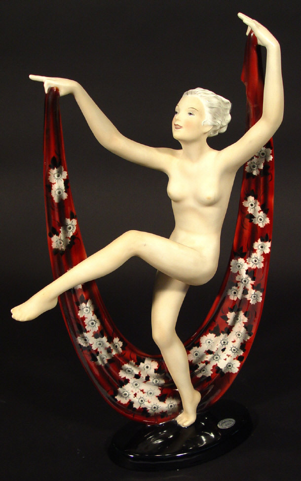 Appraisal: Art Deco Goldscheider figurine with outstretched limbs clutching a purple