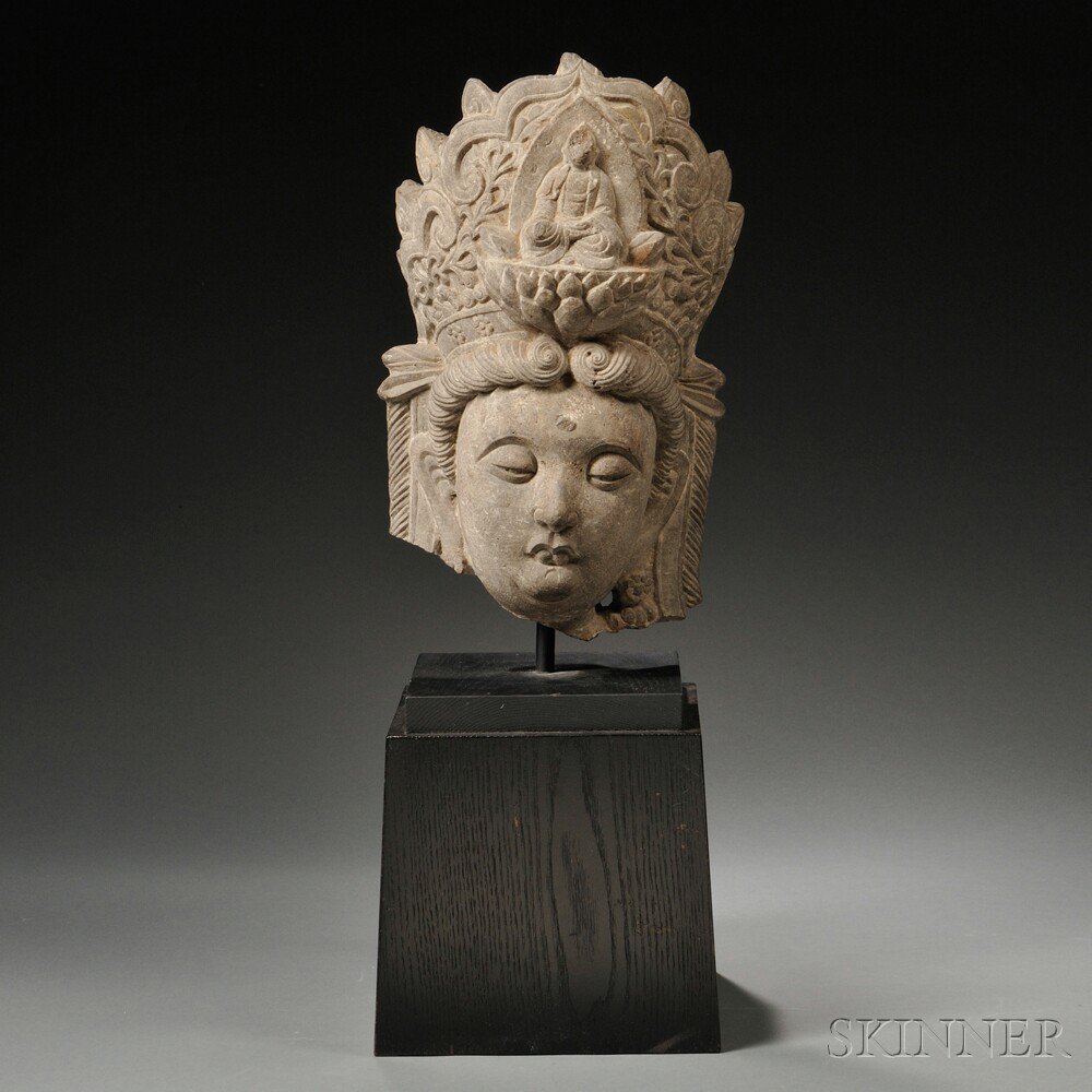 Appraisal: Gray Schist Head of Avalokitesvara possibly China the Bodhisattva wearing