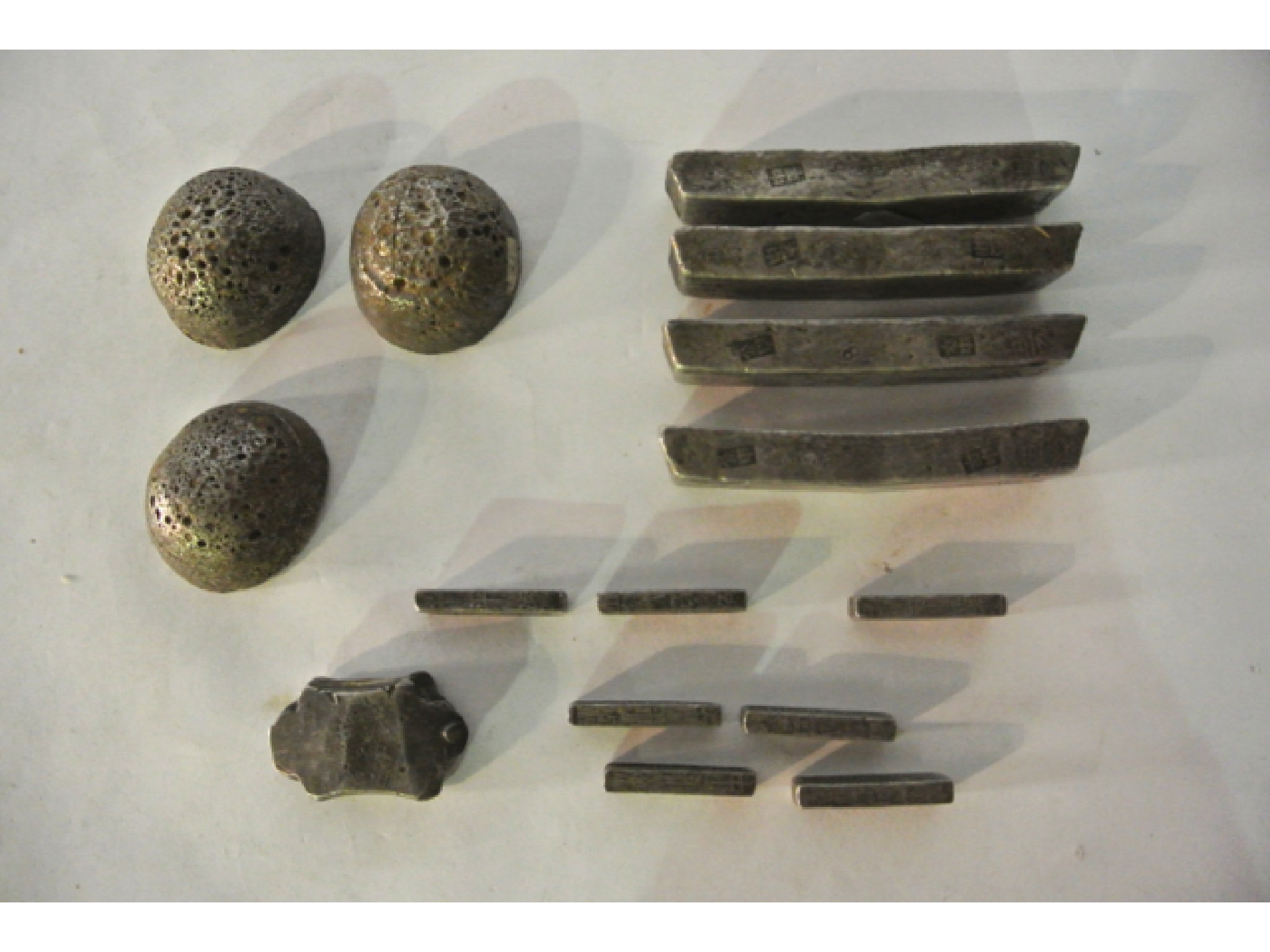 Appraisal: A collection of Chinese white metal bars ingots and weights