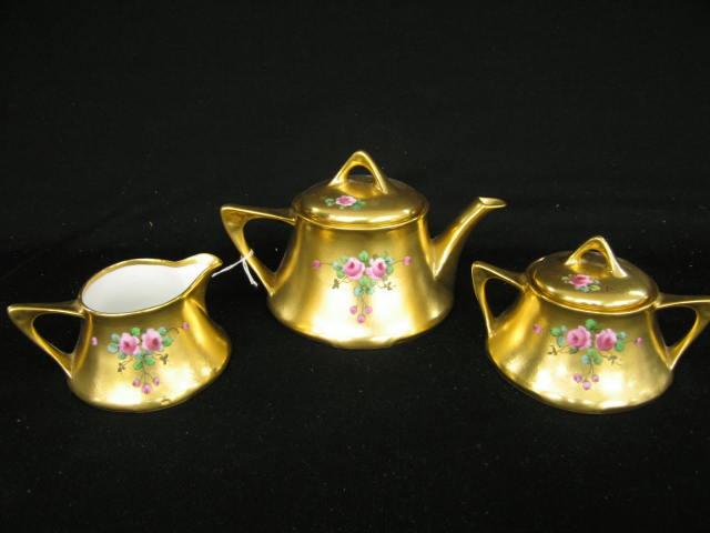 Appraisal: Pickard Handpainted China Tea Set floral on gold encrusted background