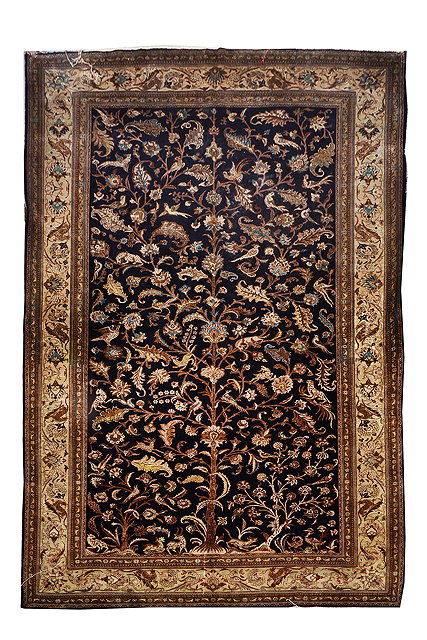 Appraisal: A PERSIAN QUM SILK RUG decorated with a central tree