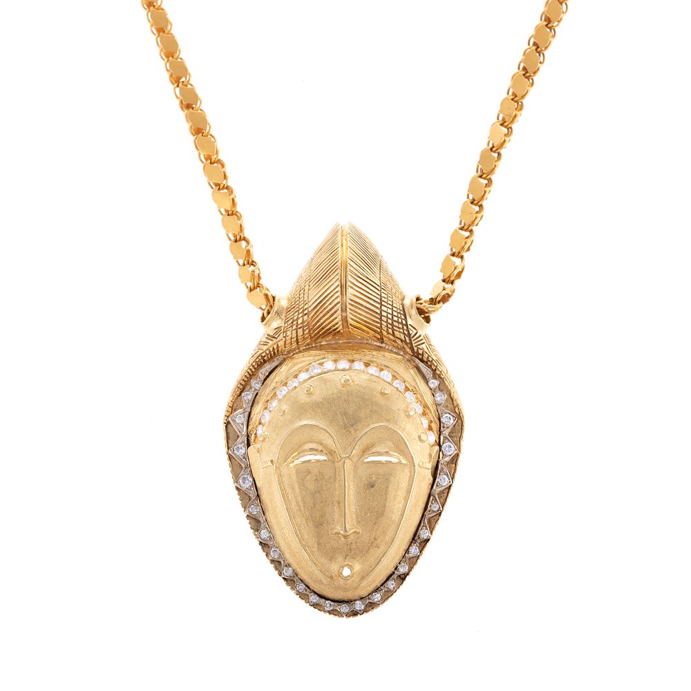 Appraisal: A Substantial K Mask with Diamonds on Chain K yellow